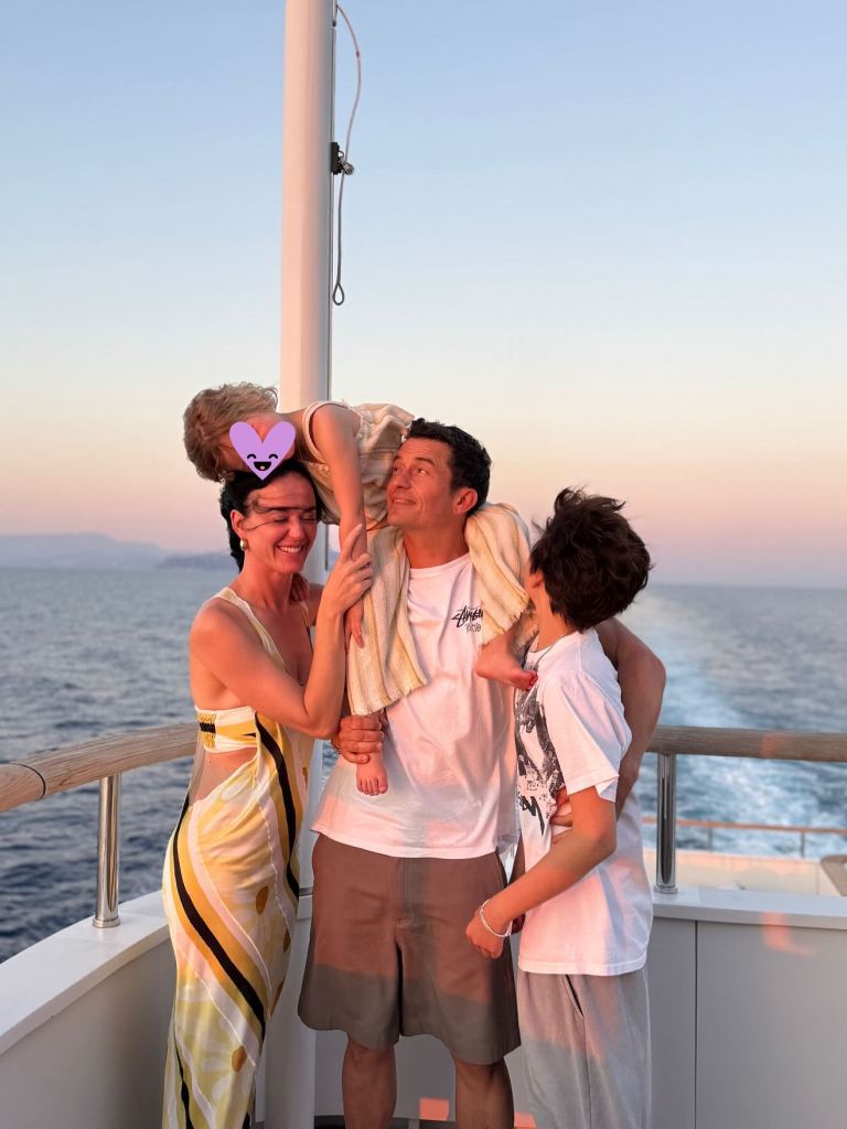 Katy Perry, Orlando Bloom, and their daughter Daisy on a boat.