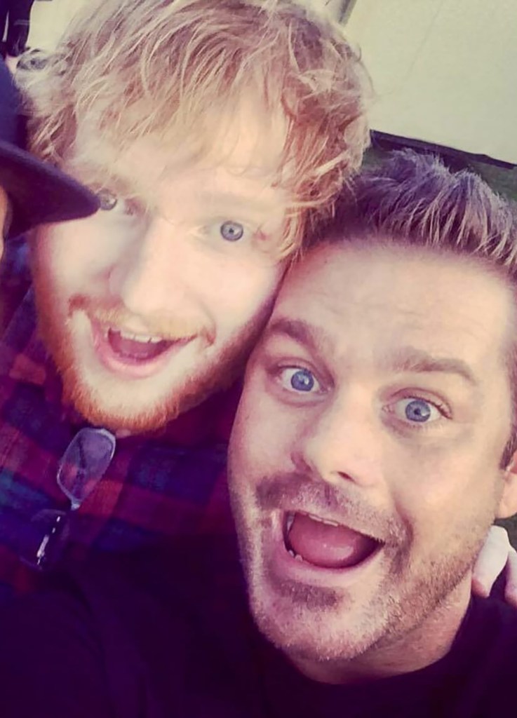 Ed Sheeran and his cousin Jethro Alonestar Sheeran taking a selfie.