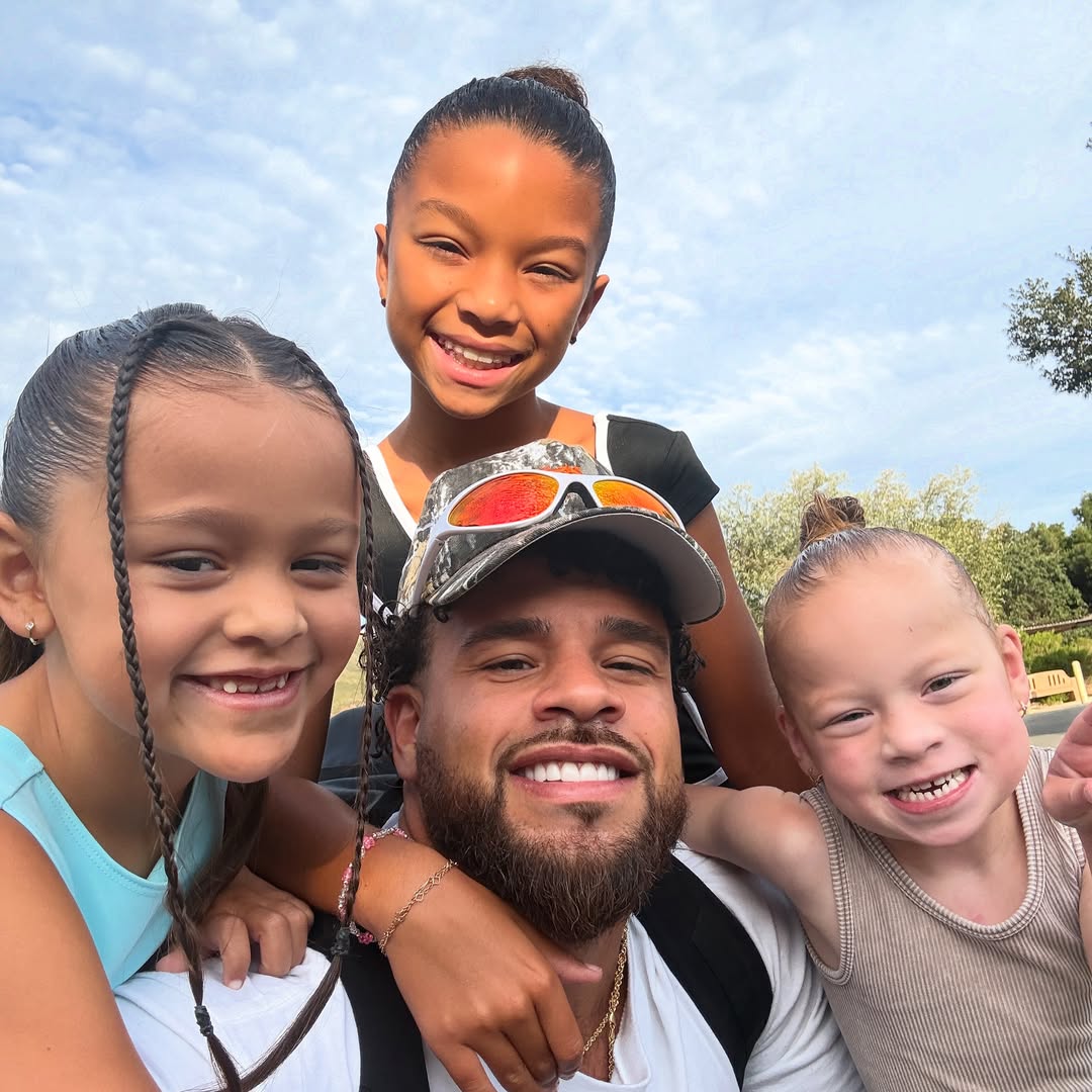 Cory Wharton with his three daughters