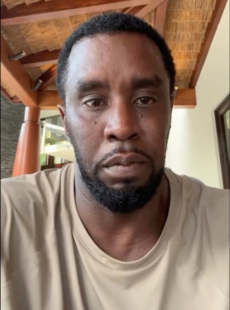 Sean Diddy Combs looks directly at the camera with a neutral expression.
