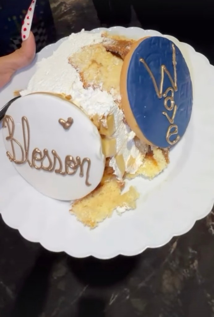 A messy slice of birthday cake with 