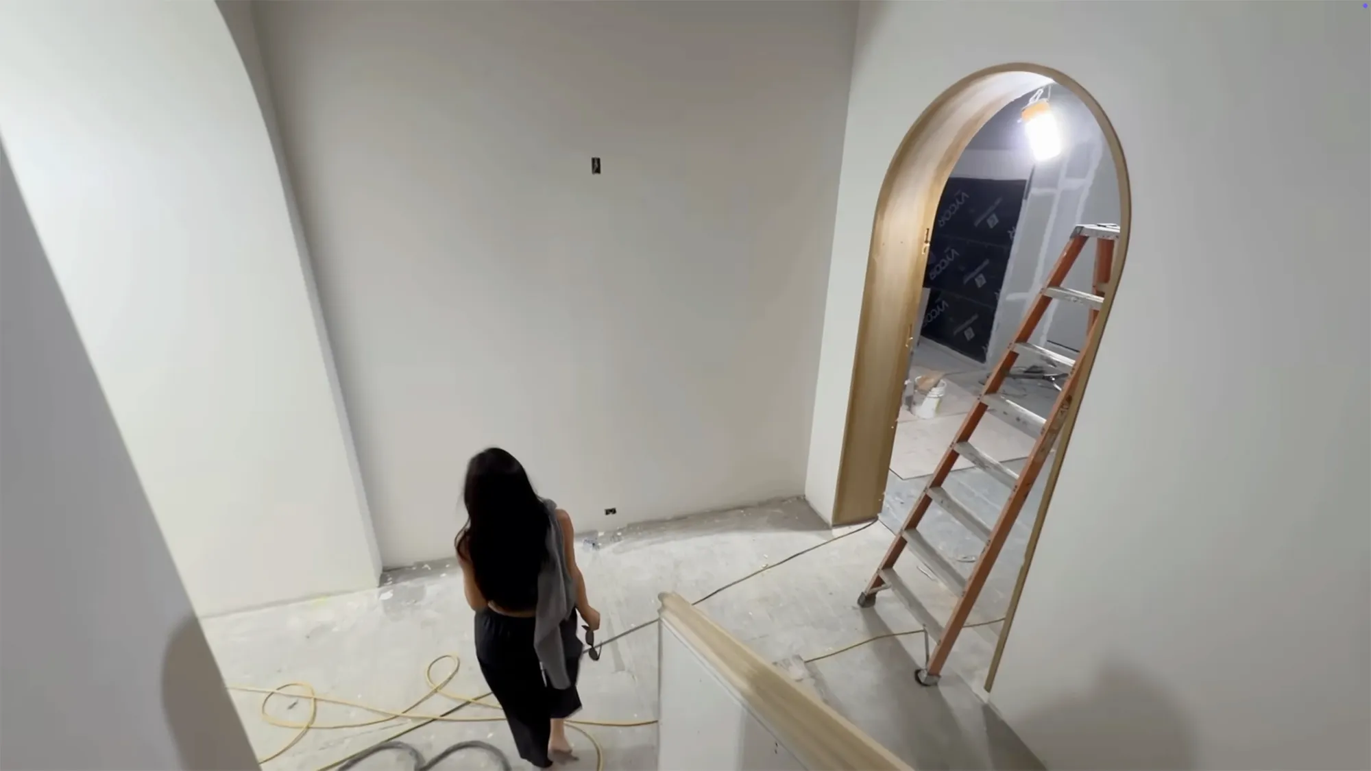Kylie Jenner's new home under construction with a ladder and archway.