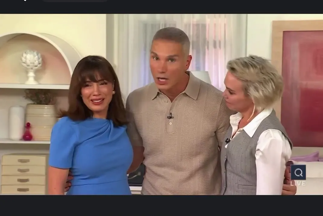 Popaj crying on QVC after being surprised by her loved ones.
