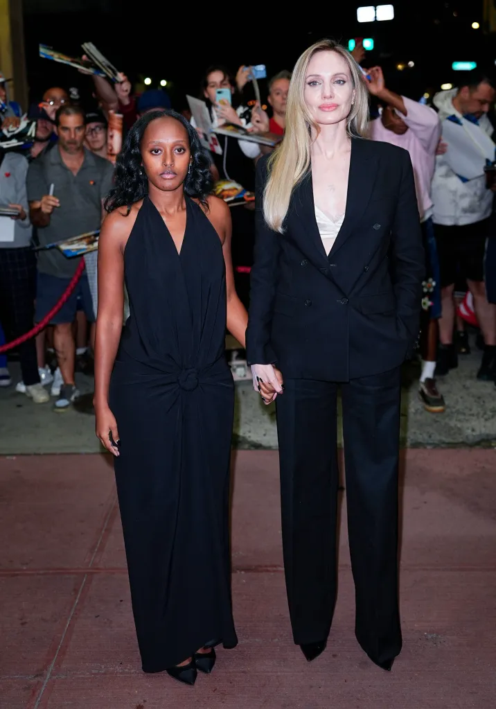 Zahara Marley Jolie and Angelina Jolie holding hands at the premiere of 