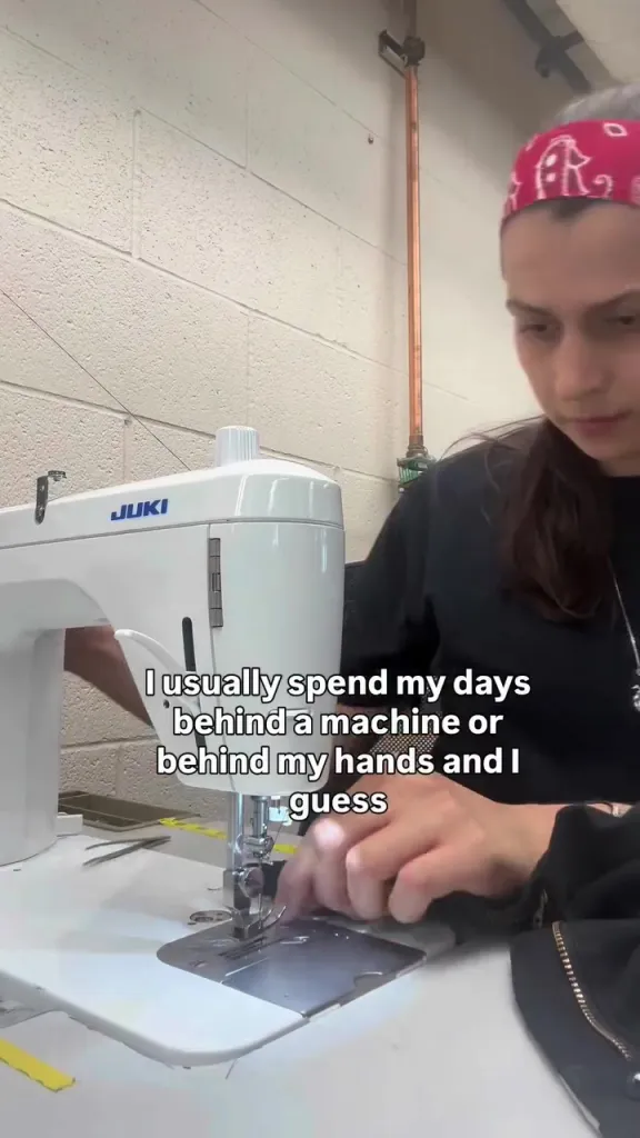 Zoe De La Paz sewing on a JUKI machine.