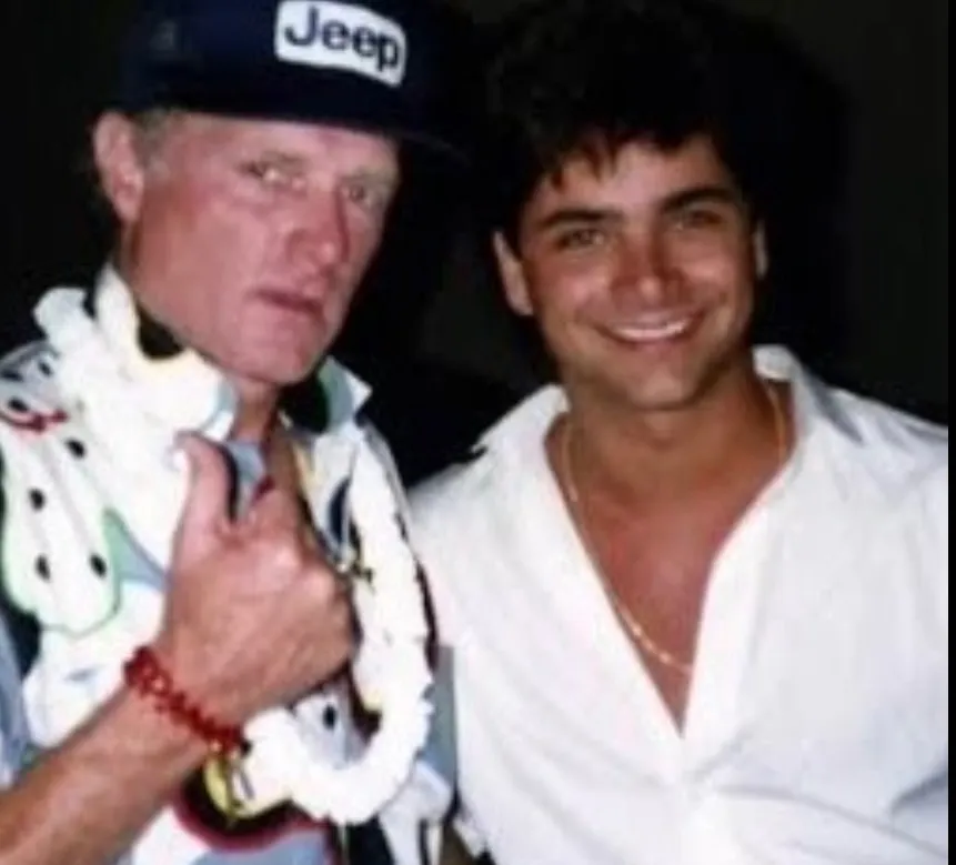 Photo of Mike Love and John Stamos together.