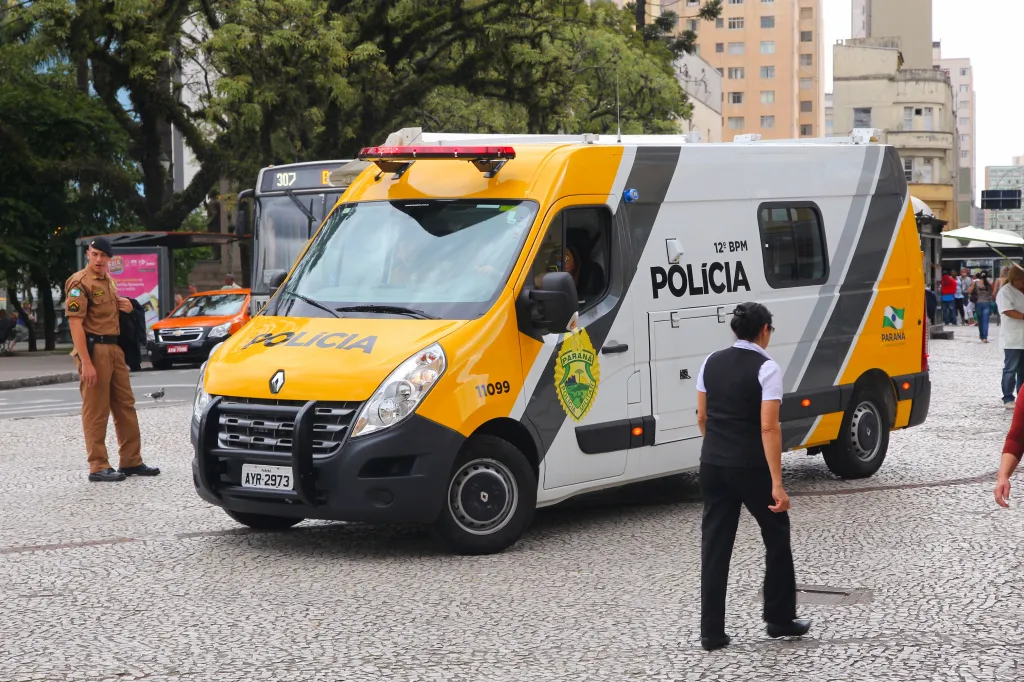 Police officers patrol in a vehicle in Curitiba, Brazil.