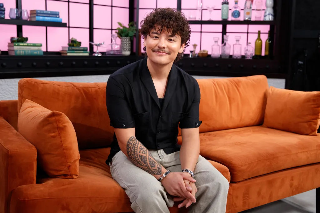 Collin Gosselin sitting on an orange couch during a Page Six Virtual Reali-Tea interview.