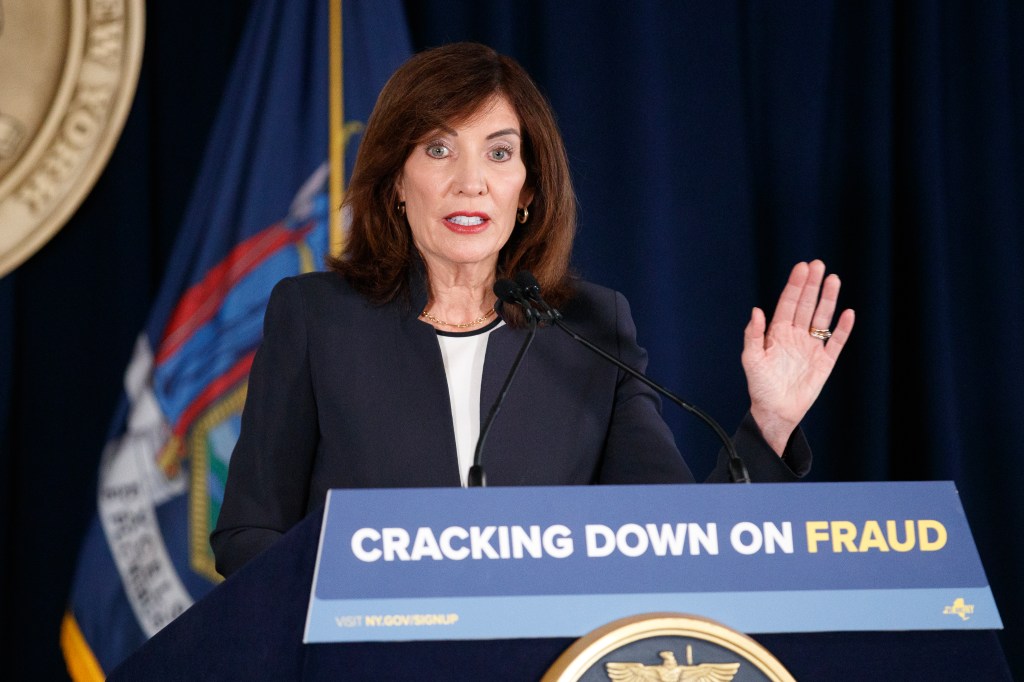 Governor Kathy Hochul speaks at a press conference regarding auto insurance fraud arrests.