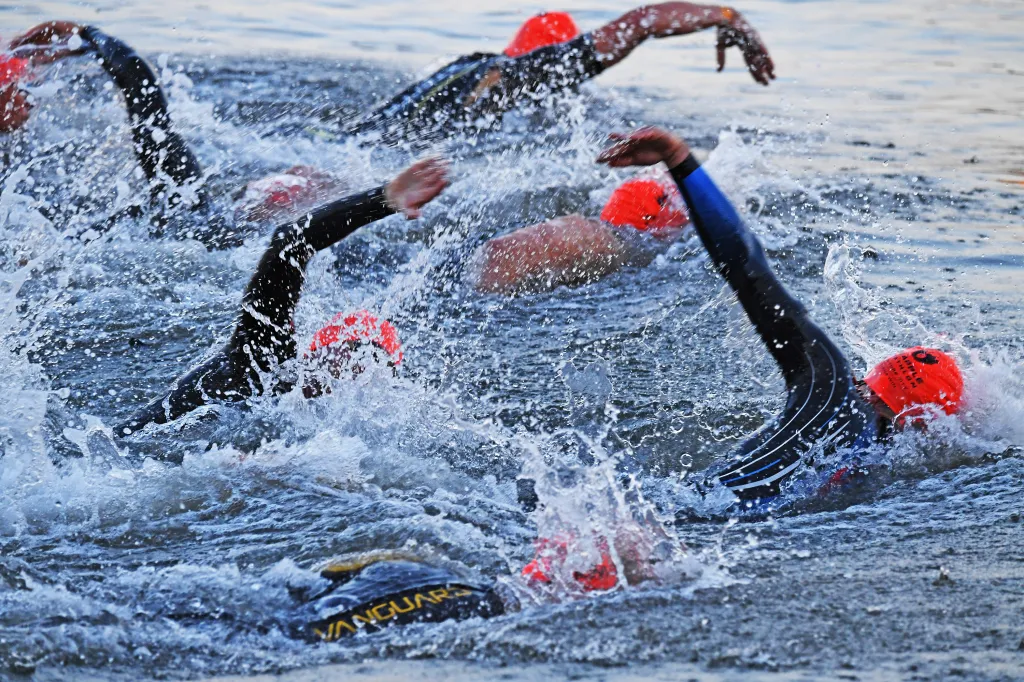 Competitors enter the Hudson River at the start of the NYC Triathlon.