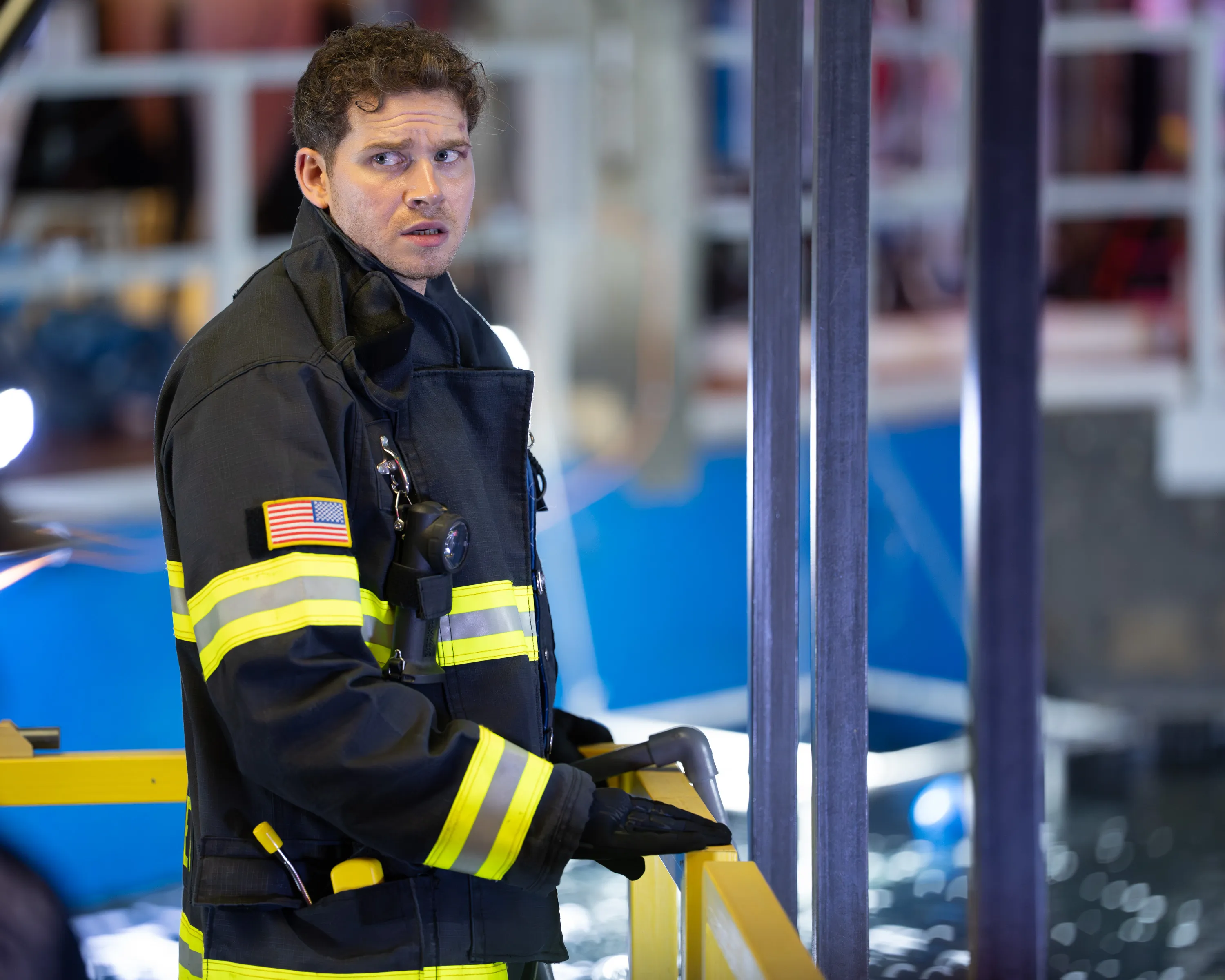 Oliver Stark as firefighter Evan