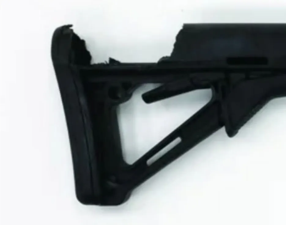 FBI image of the damaged buttstock of Crooks’ rifle showing breakage along the top edge.