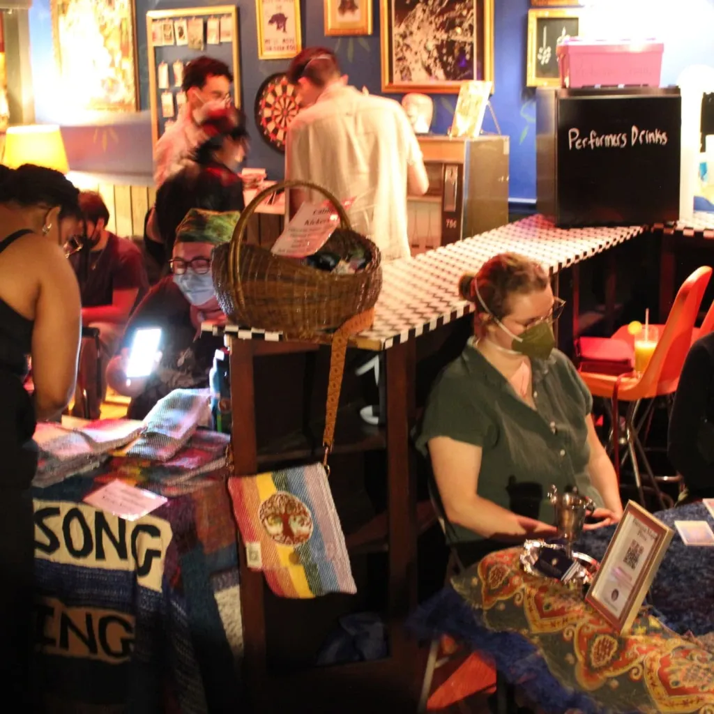Attendees wear face masks inside the Last Ditch Bar.