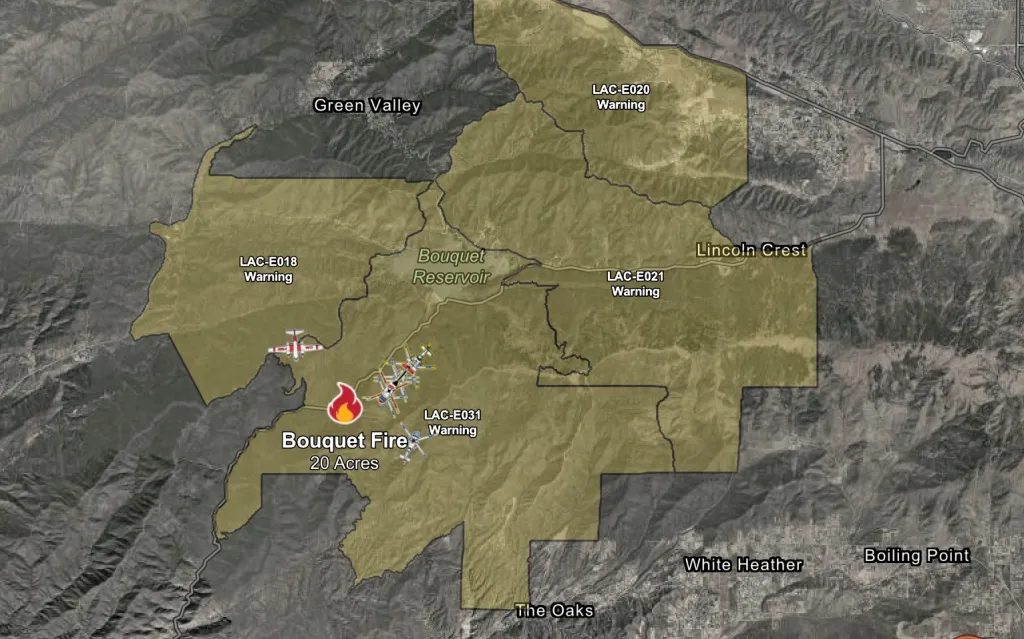 Map of the Bouquet Fire, spanning 20 acres, with evacuation warning zones near Bouquet Reservoir.