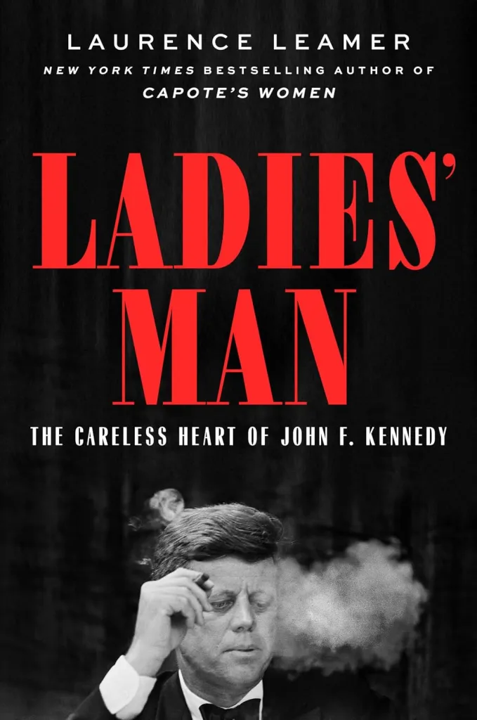 Book cover of Ladies' Man: The Careless Heart of John F. Kennedy by Laurence Leamer, featuring a black-and-white photograph of John F. Kennedy smoking a cigar.