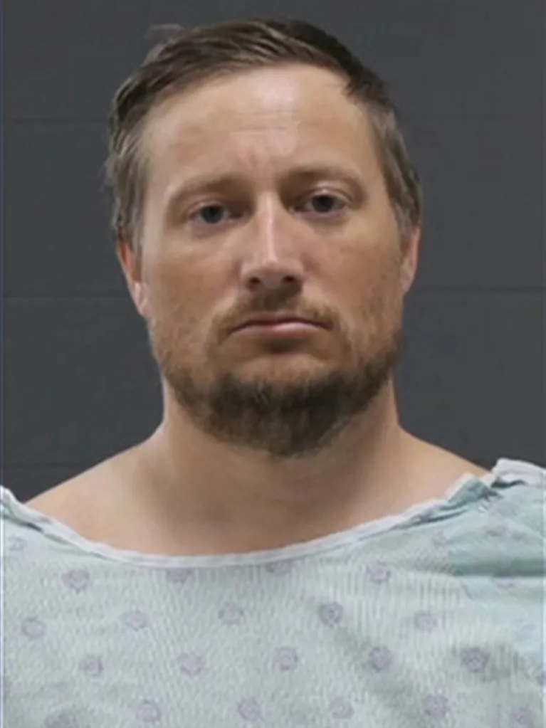 The suspect, Brandon John Oetken, 39, of Sioux Falls, was charged with three counts of attempted first-degree murder of a law enforcement officer and three counts of aggravated assault on a law enforcement officer.