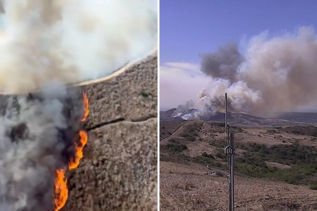 Wildfire races through SoCal as structures threatened by wind-fueled blaze