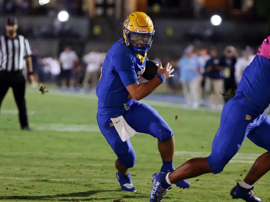 Battle Ground Academy's Bo Bryan (15) runs the ball against Franklin Road Academy.
