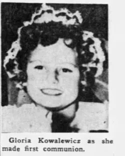 Newspaper photograph of a young Gloria Kowalewicz wearing a veil for her first communion.