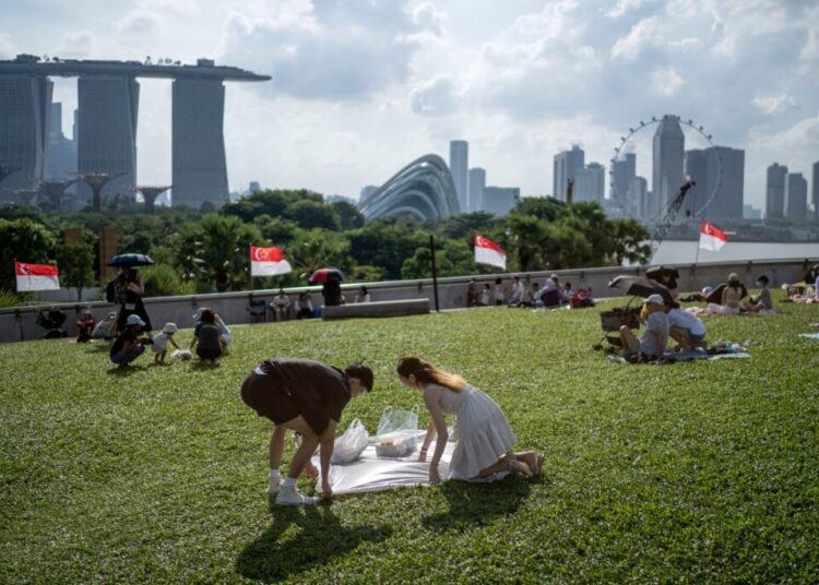 Singapore launches government dating app as birth rate plunges