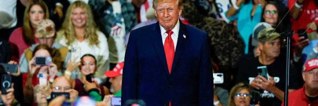 MAGA fan rushes back to Trump rally in hospital gown after having a seizure