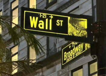 Stocks rise near their record after the latest jobs report eases worries about inflation