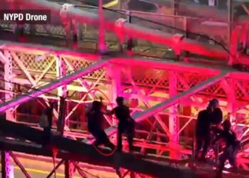Drone footage captures moment police fatally shoot knife-wielding nut — as he lunges at them from atop the Brooklyn Bridge
