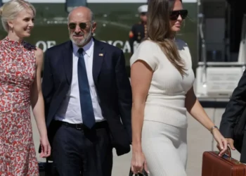 Trump gushes over ‘beautiful’ younger aide onstage as Natalie Harp looks on