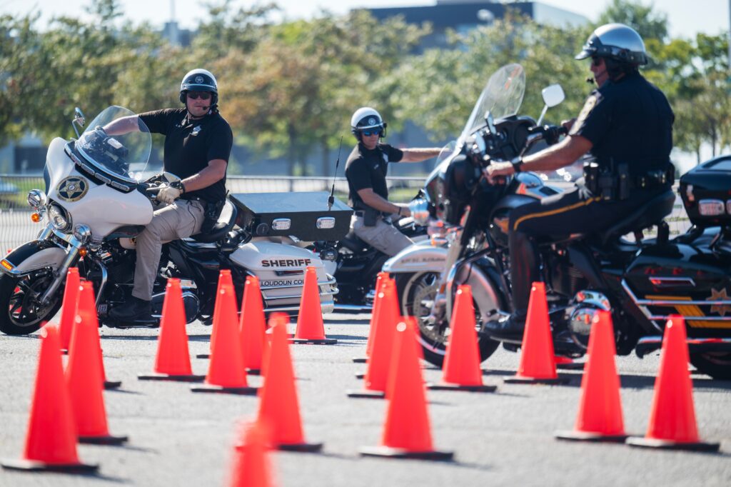 On Harleys and BMWs, officers rumble through a police motorcycle rodeo