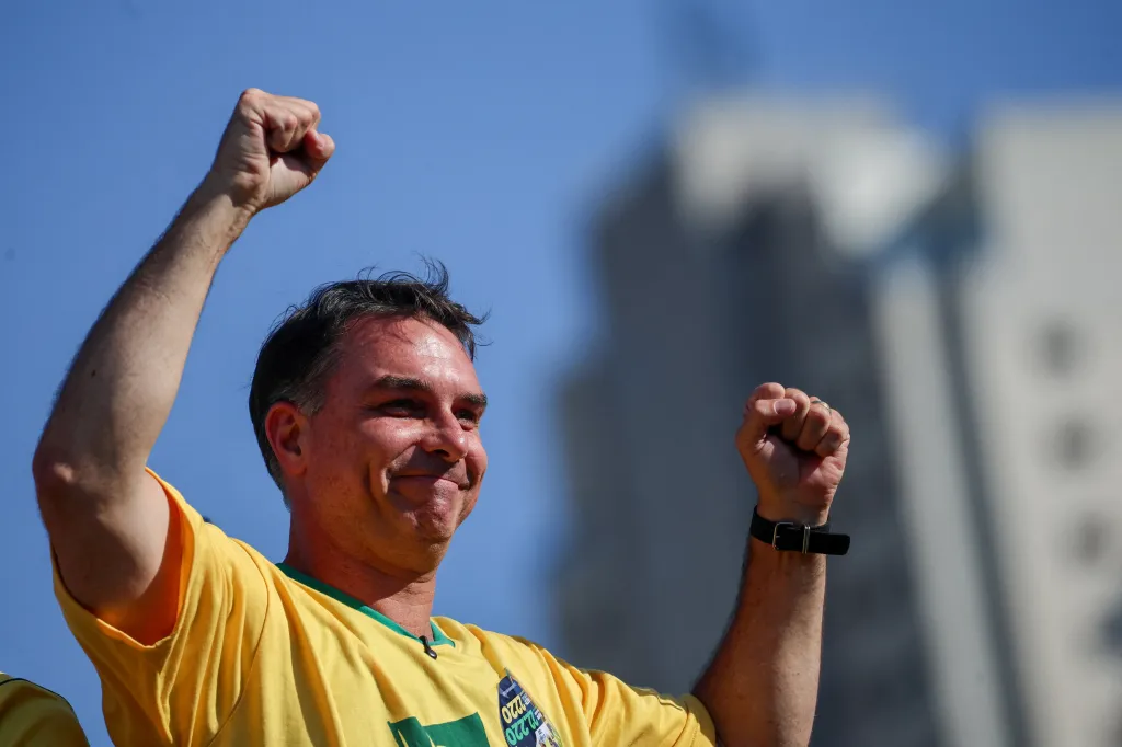 Brazilian presidential candidate Flavio Bolsonaro gestures at a campaign rally in Goiania, Brazil.