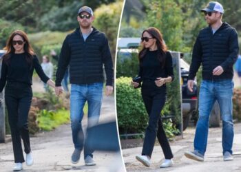 Prince Harry and Meghan Markle hold hands on romantic pub date in first photos together since UK return