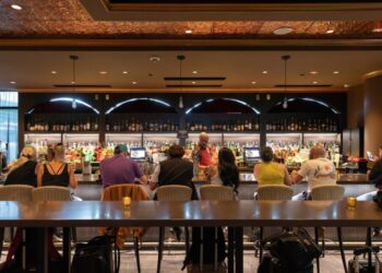 At airports, secret bars promise an escape. If you can find them.