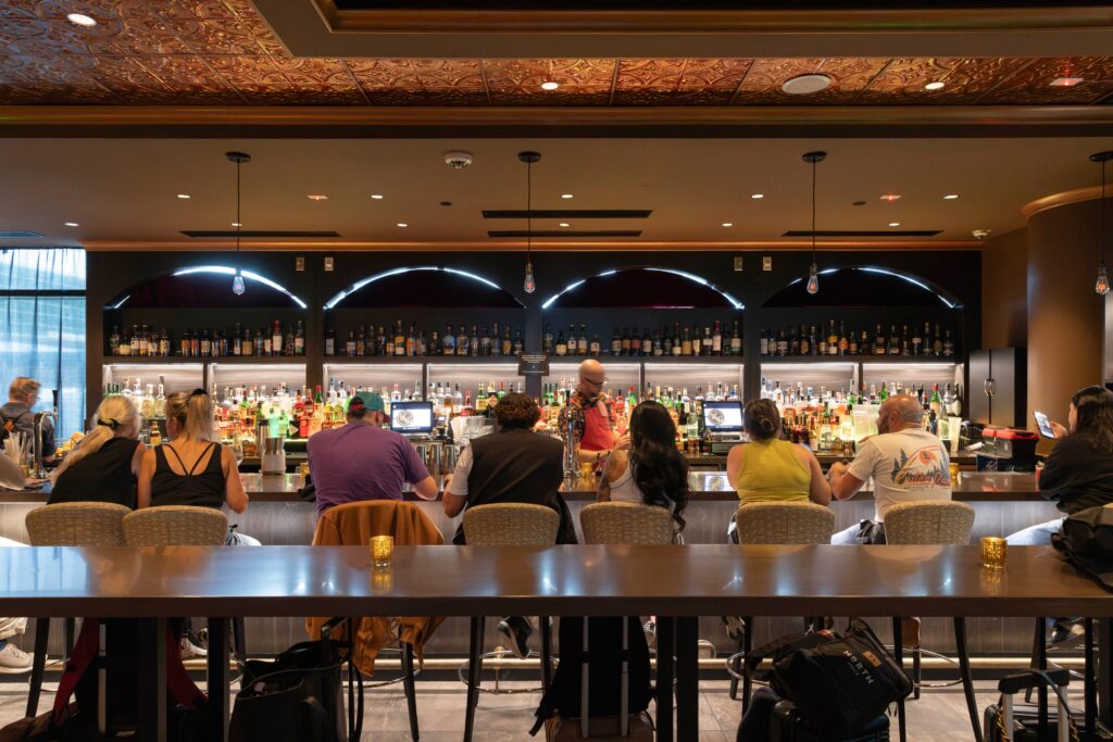 At airports, secret bars promise an escape. If you can find them.