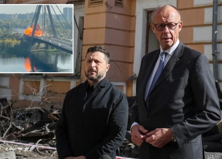 Russian drone slams into key Kyiv bridge during German chancellor’s visit as Putin prepares mass military mobilization: report