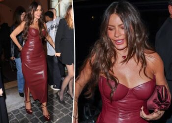 Sofia Vergara stuns in body-hugging burgundy leather dress during Paris Fashion Week