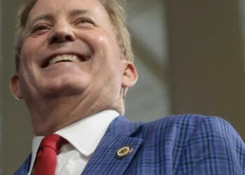 Mass confusion as Ken Paxton ad shows MAGA candidate tearing down missing child flyer