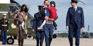Usha Vance nearly tumbles down helicopter stairs while carrying infant son