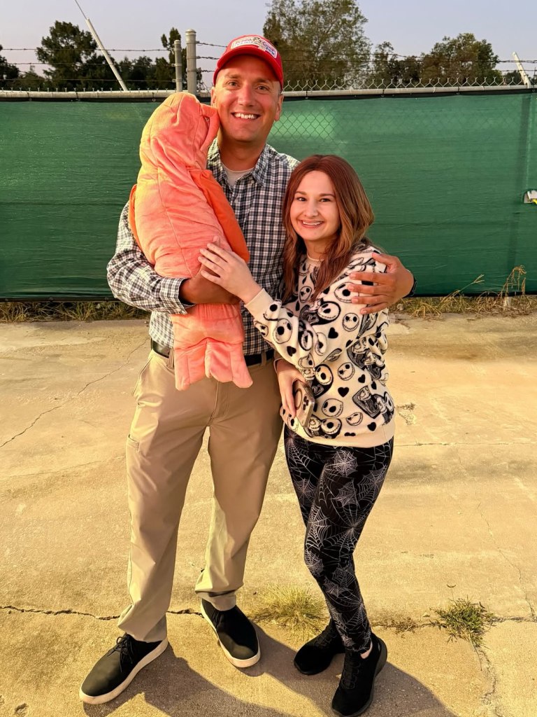 Gypsy Rose Blanchard and Ken Urker posing together outdoors.