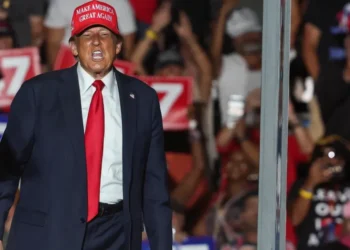 Trump condemned for ‘victory lap’ over Haitian removals miles from immigrant’s funeral