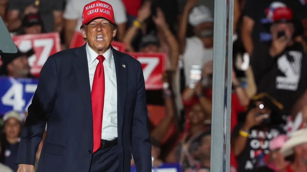 Trump condemned for ‘victory lap’ over Haitian removals miles from immigrant’s funeral