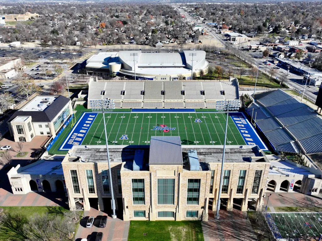 Colleges across the country are slashing published tuition prices as schools battle sticker shock, enrollment pressures and growing scrutiny over the cost of a degree. The image above shows the University of Tulsa campus.