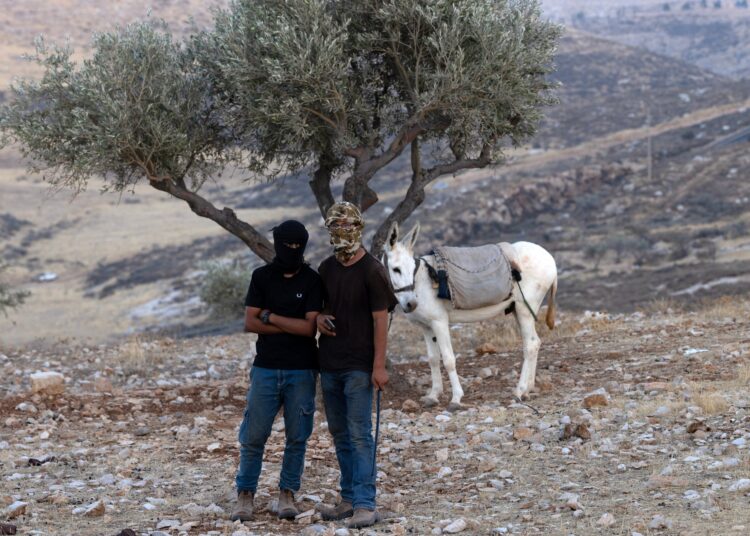 With attention on Gaza and Iran, Israeli settlers grab land in West Bank