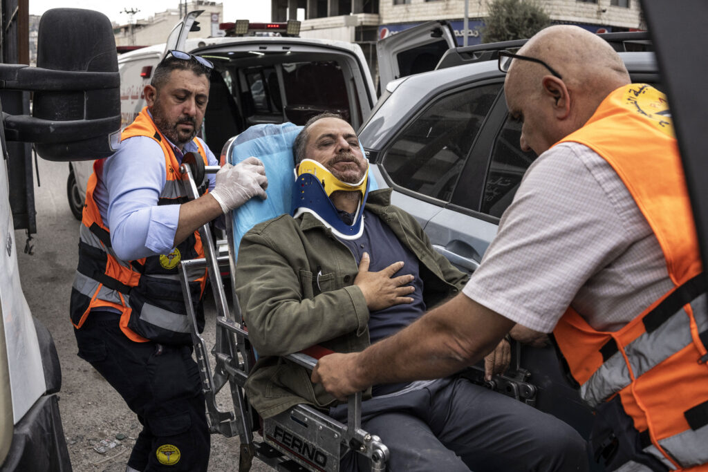 Israeli settlers beat AFP photographer covering violence in West Bank