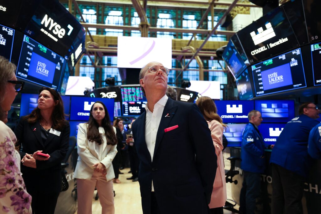 Stocks hit record high even as consumers feel dreary