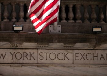 Wall Street retreats from its record as stocks fall worldwide