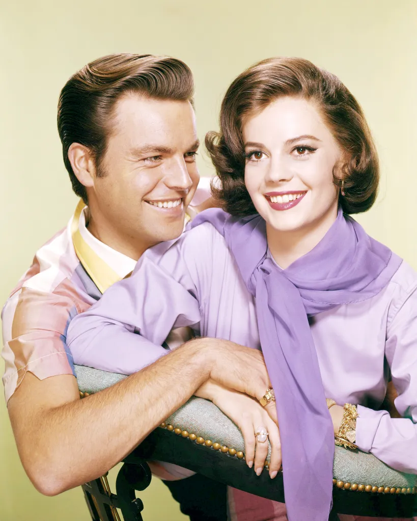 Portrait of American actors Robert Wagner and Natalie Wood smiling together.