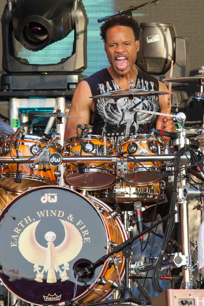 John Paris of Earth, Wind & Fire performs on drums onstage.