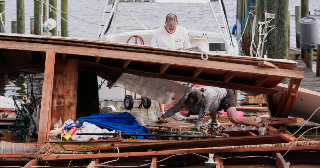 Isaias weakens, but flooding threat and outages persist