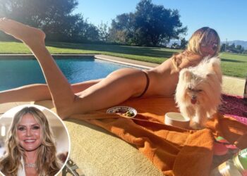Heidi Klum ditches her top, sunbathes in nothing but a thong by the pool during LA heatwave
