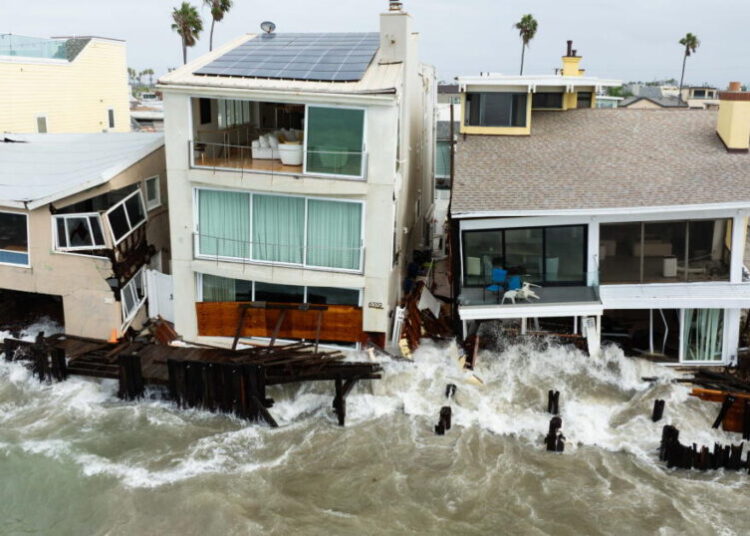 Heavy surf, red-tagged homes, a battered boardwalk: Long Beach confronts costly climate reality